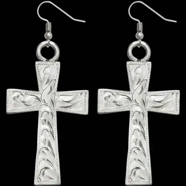 This stunning set of Cross Earrings are crafted on a hand engraved, German silver base with a simple edge to show off the beauty of detailed scrolls.  .5"" x 1.5

Browse more Western Jewelry by clicking Custom Bracelets and C